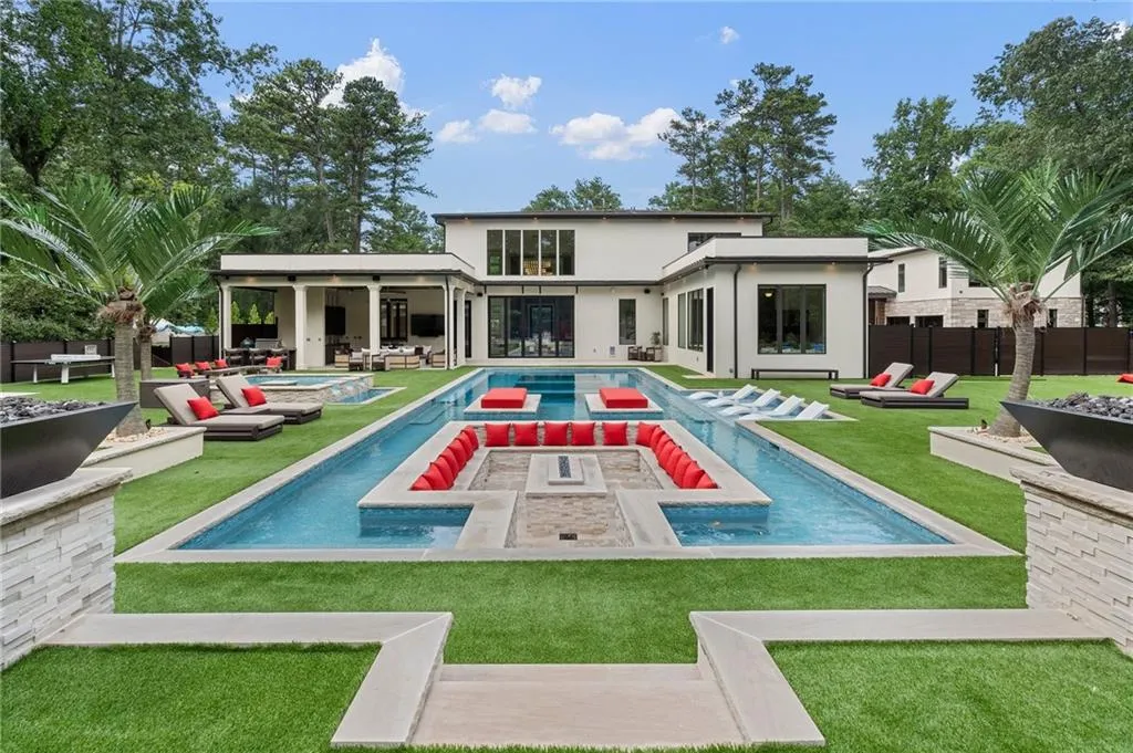 Sunken fire pit inside pool with seating for 20