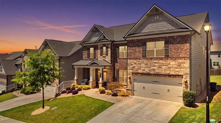 Stone and brick facade with gabled roof lines
