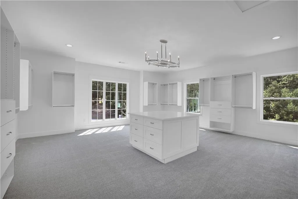Master closet photo Not indicative of our finishes