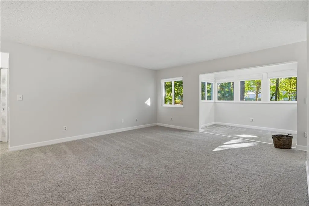 Living Room Opens to Sunroom