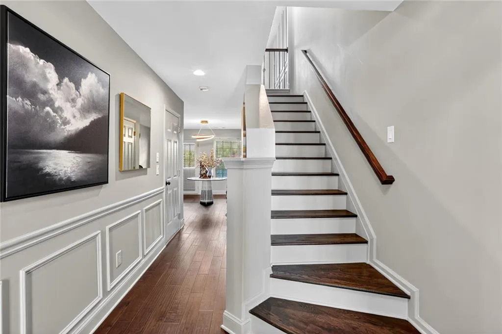From the moment you walk-in, you are greeted with attention to detail and the beaming hardwoods.  Down the hall is the spacious flex space with lots of light.