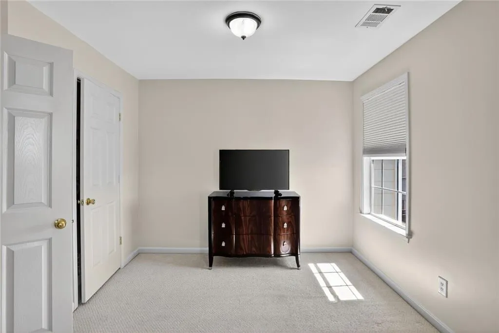 Expanded bedroom, can be left as 1 large bedroom or can be transformed back to have 2 add'l bedrooms upstairs.