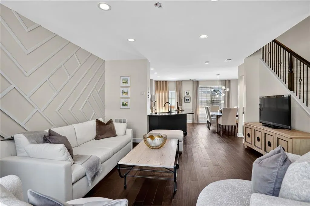 The well lit family room is open to the kitchen and dining room, offering plenty of space for all your entertaining needs.