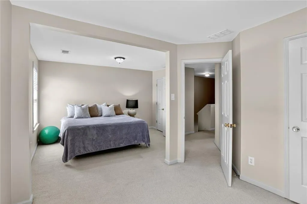 The 2nd and 3rd bedroom were combined to make 1 large bedroom.  Both entry doors and custom closets remain.  THE OWNER IS WILLING TO HAVE THE WALL PUT BACK UP BEFORE CLOSING.