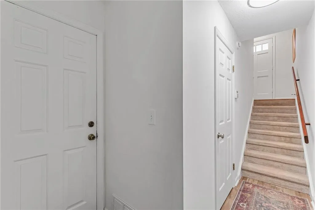 Entry to terrace level from garage. Stairs leads to main level.