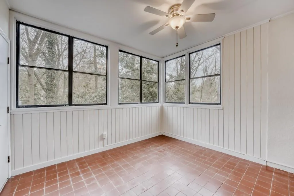 Sunroom featuring plenty of natural light