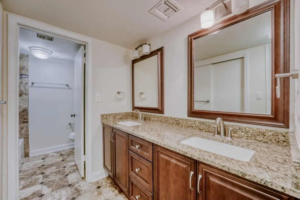 Master Bathroom with double vanity, Tub/shower & toilet