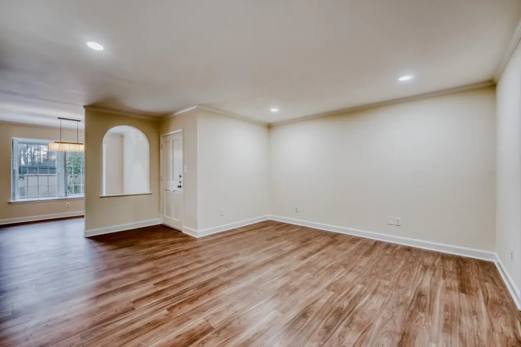 Great Room featuring light wood finished floors, ornamental molding, and recessed lighting