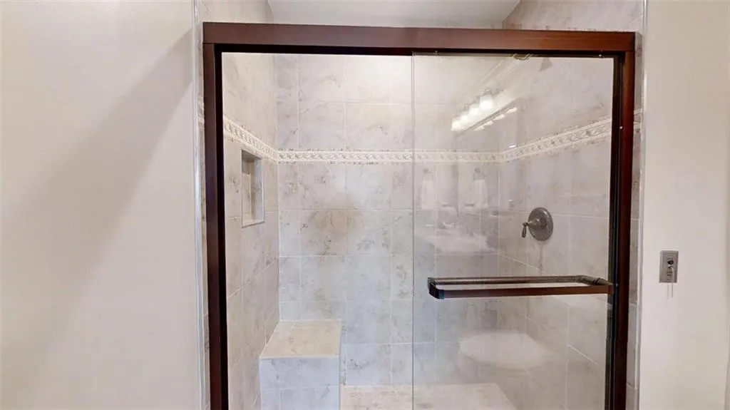 Bathroom featuring a stall shower