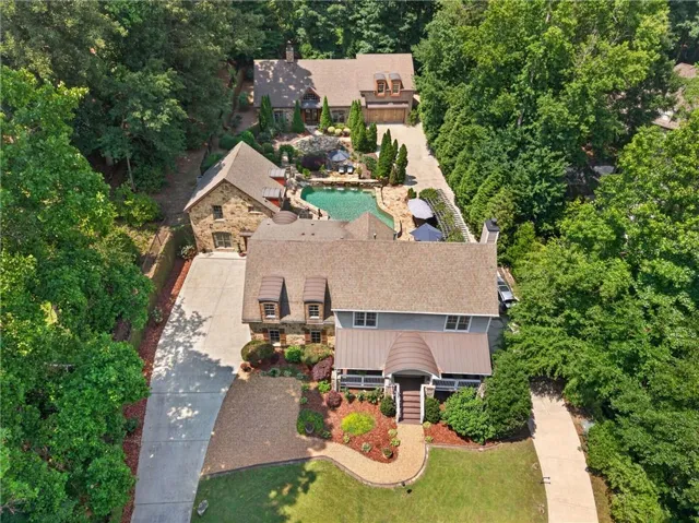 3 structures on property- Main house, pool house,secondary house (guets, staff, in laws, entertaining area)