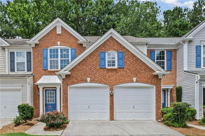 Brick and siding exterior with gabled roof lines