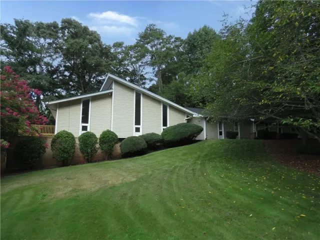 Welcome to Homepath by Fannie Mae . . . Updated Architecturally Inspiring Modern 3 Bedrooms, 3 Baths Main, Full Finished Lower Level with 1 Bedroom, 1 Bath and Two Large Finished Areas.