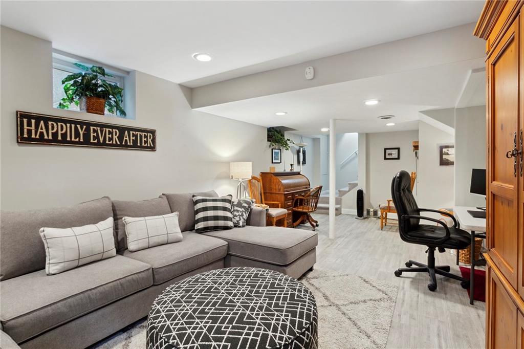 Living room with light hardwood / wood-style floors Living room with light hardwood / wood-style floors