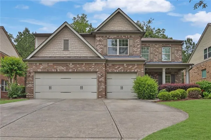 Brick and siding exterior with gabled roof lines