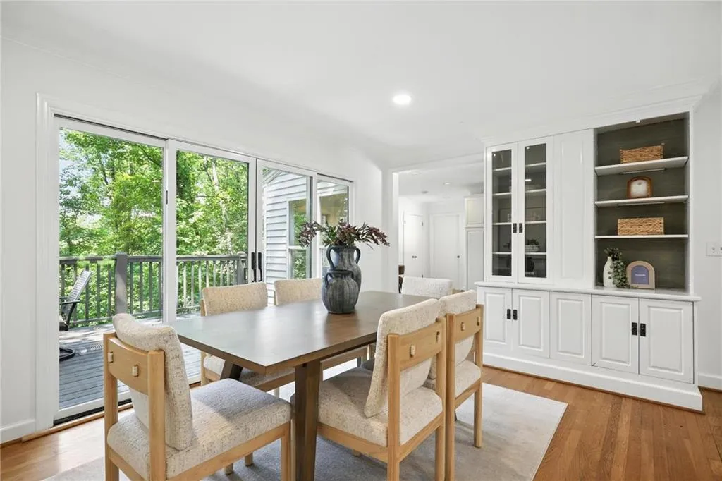 Dining room featuring light wood finished floors and recessed lighting