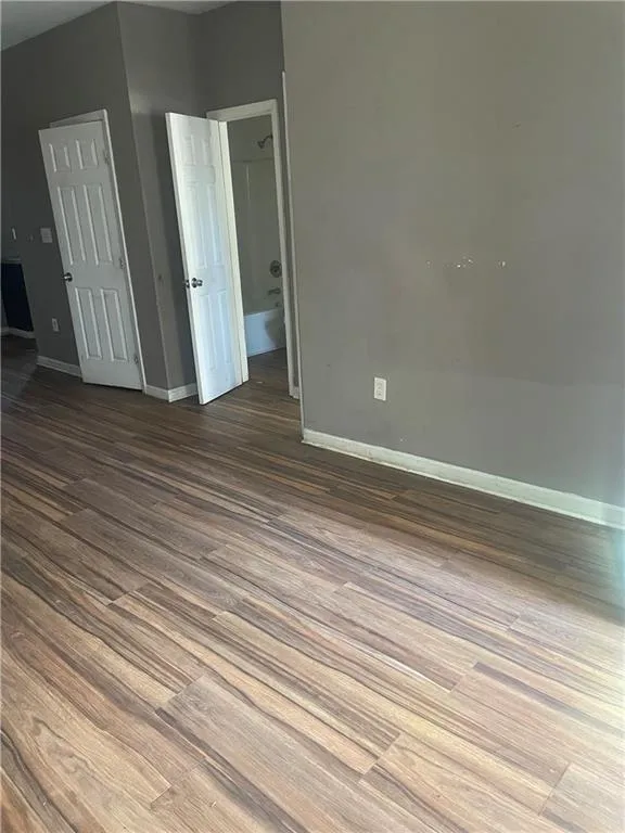 Spare room featuring hardwood / wood-style floors
