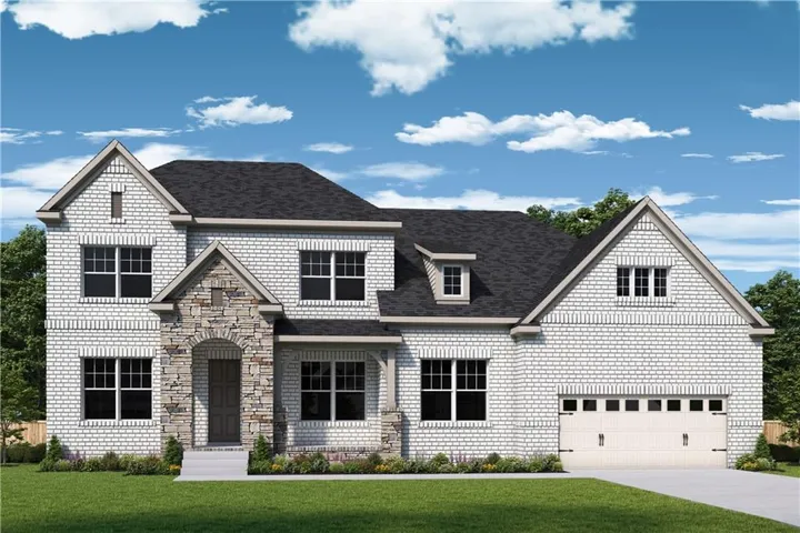 Two-story exterior featuring white brick and stone accents, a dark shingle roof, a two-car garage, and multiple gabled sections