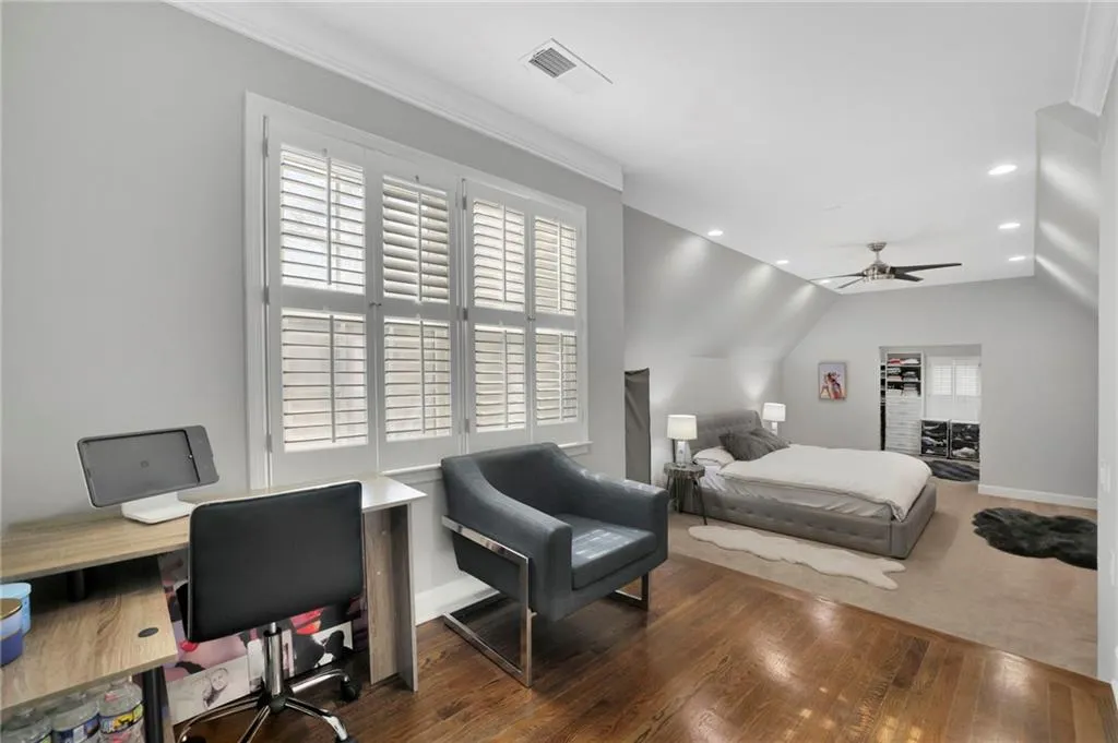 Bedroom with recessed lighting, a desk, lofted ceiling, hardwood / wood-style flooring, and a ceiling fan