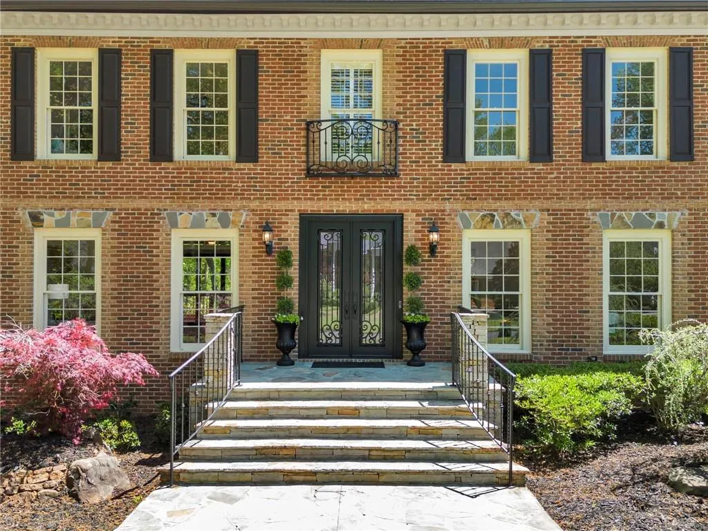 View of front of property featuring french doors View of front of property featuring french doors