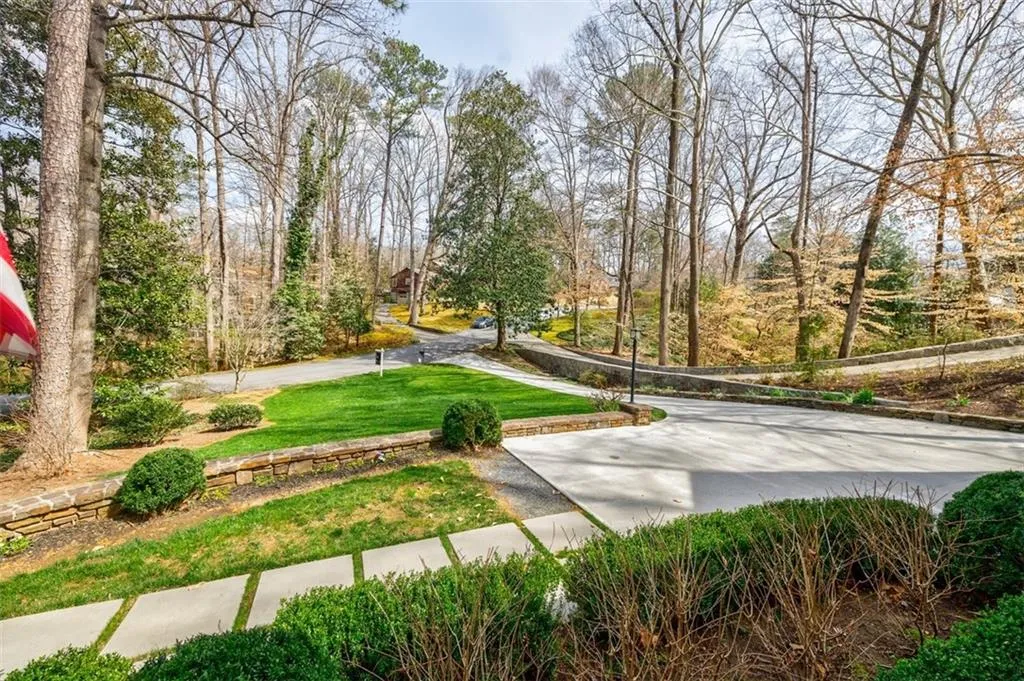 Beautiful view of front lawn from covered front porch.