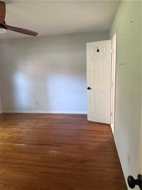 Hardwood-style flooring extends throughout this interior space