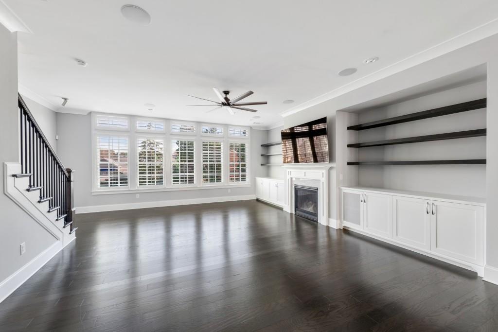 Expansive Living Room flooded with Natural light and large windows