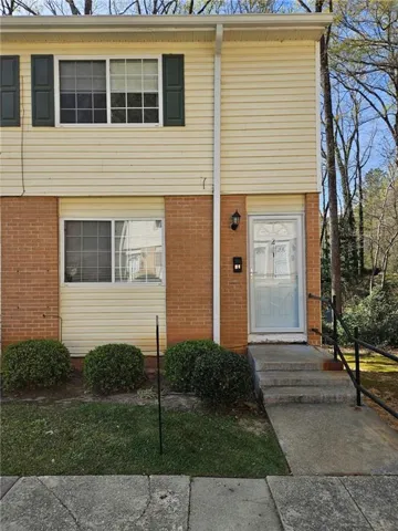 View of front of home with brick siding