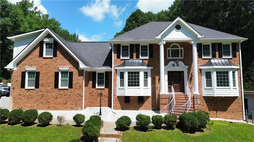 Brick exterior with white trim