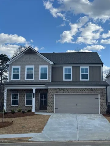 View of front of property with a garage
