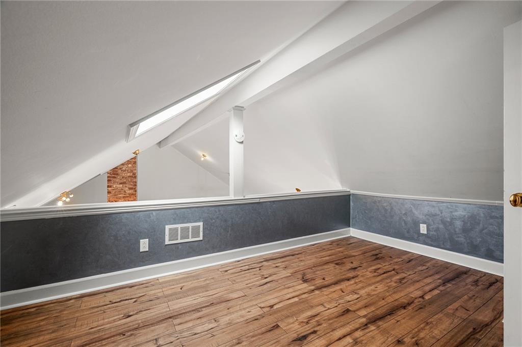 Loft adjoining Bedroom 3, overlooking living and dining areas.  Great place for a playroom, craft area or study!