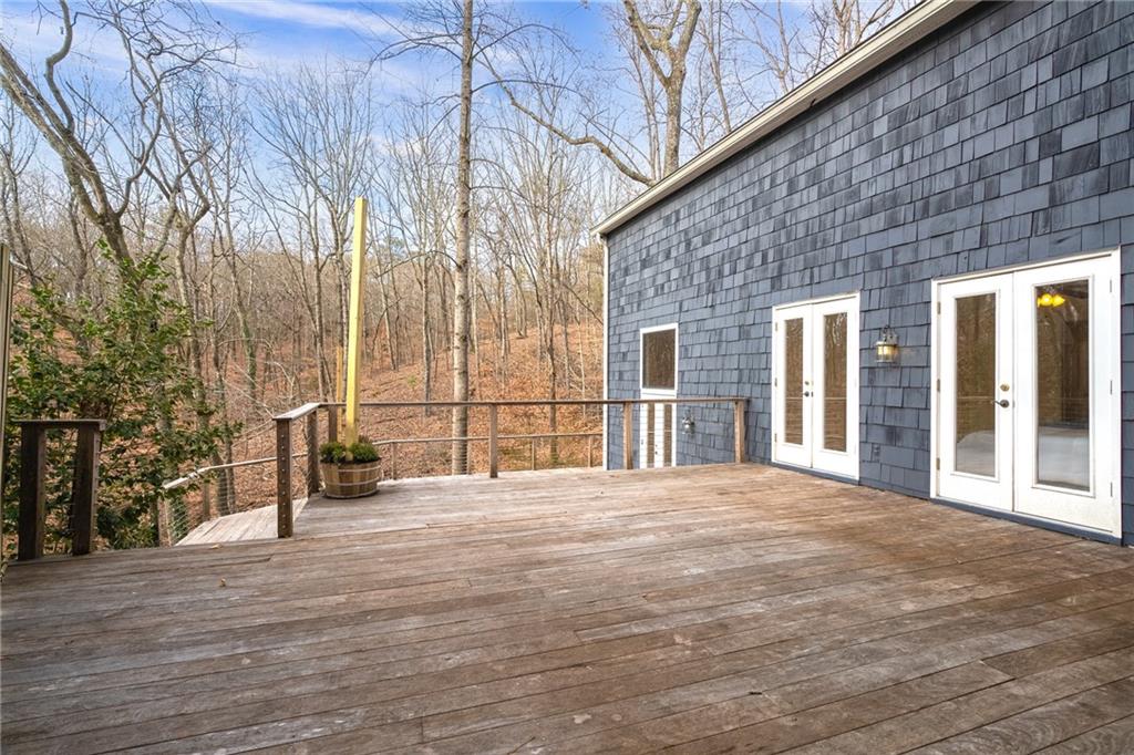 Deck overlooking wooded area
