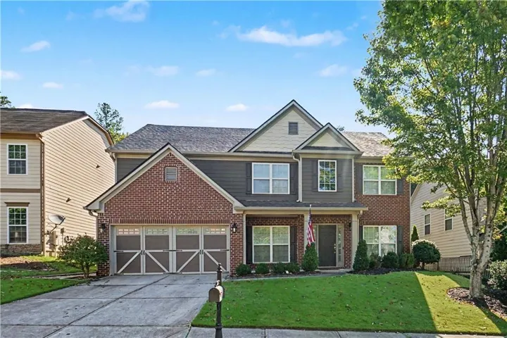 Brick and siding exterior with gabled roof lines