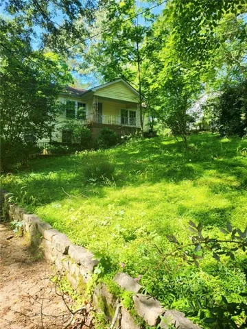 View of yard featuring a porch