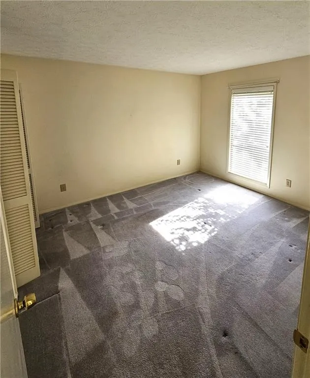 Carpeted spare room