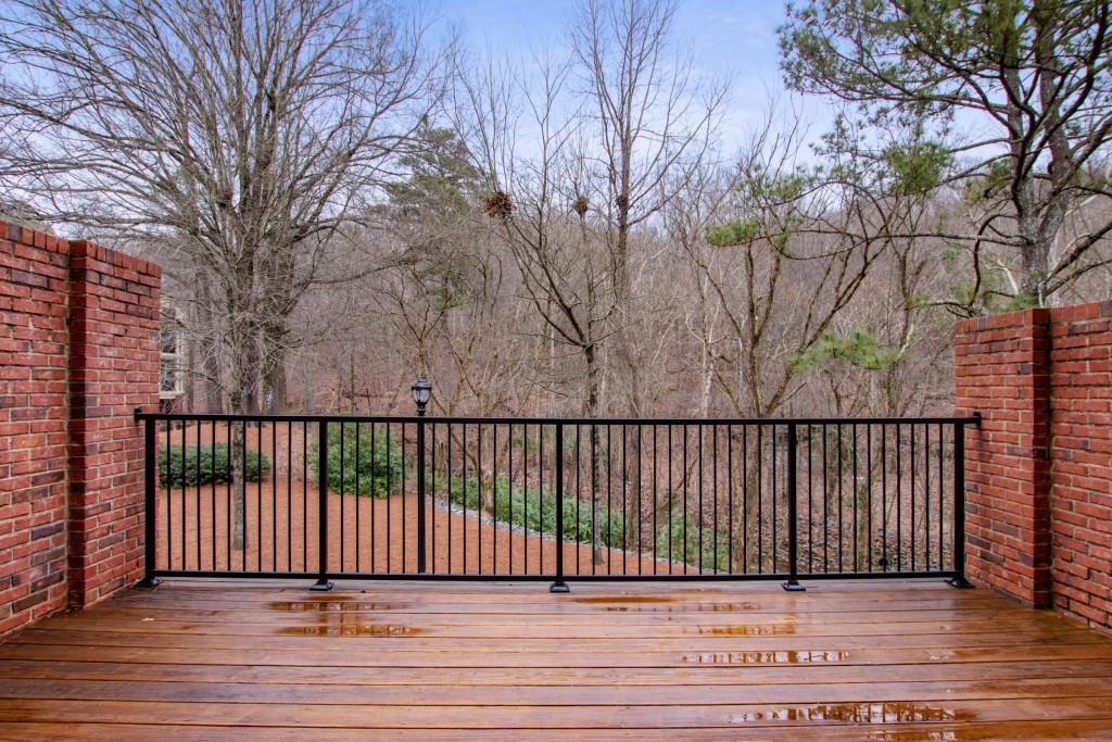 The unit backs up to a wooded greenspace, offering a private escape from the hustle and bustle of city living.