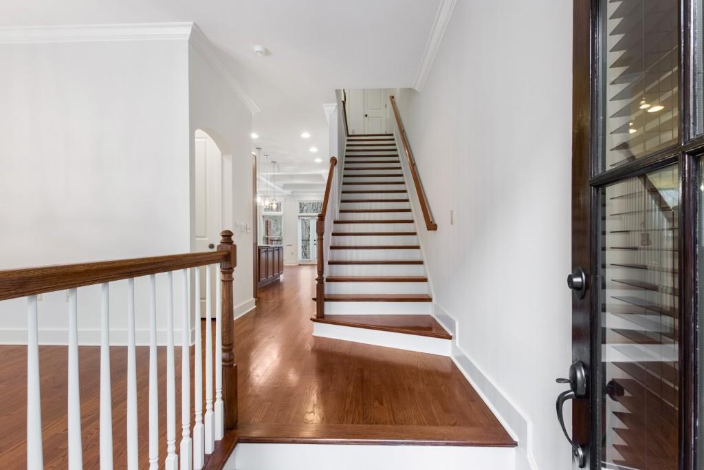 Upon entry you're greeted by beautiful hardwood floors and high ceilings.