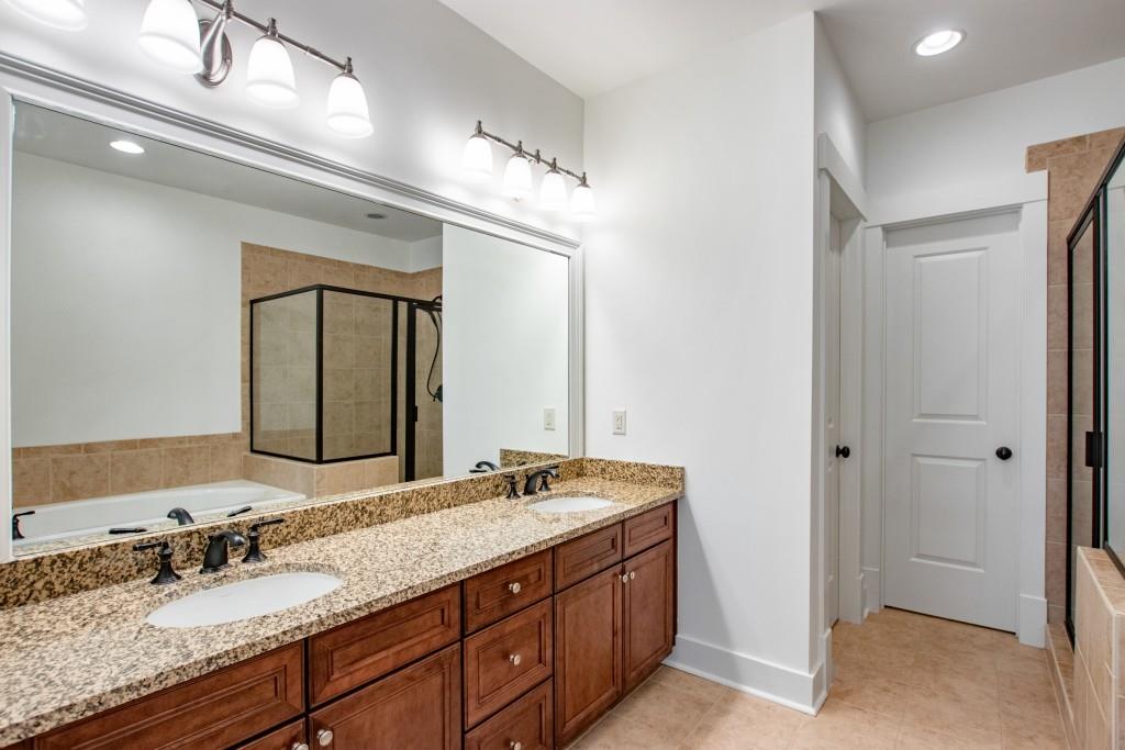 The primary en suite includes double vanities and abundant storage.