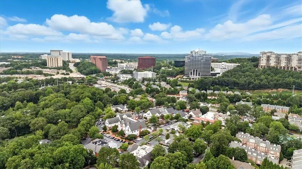 View of urban area with a tree filled landscape