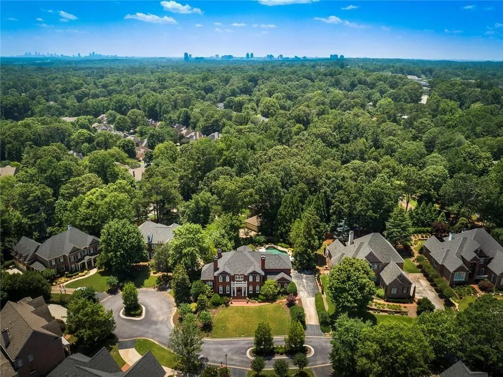 Conveniently located near shopping, dining, the Central Perimeter business district, I-285 and GA-400, and a wide range of nearby schools and amenities. Homes offering this level of space, updates and a gated setting are increasingly rare in Sandy Springs, making this a truly move-in-ready opportunity.