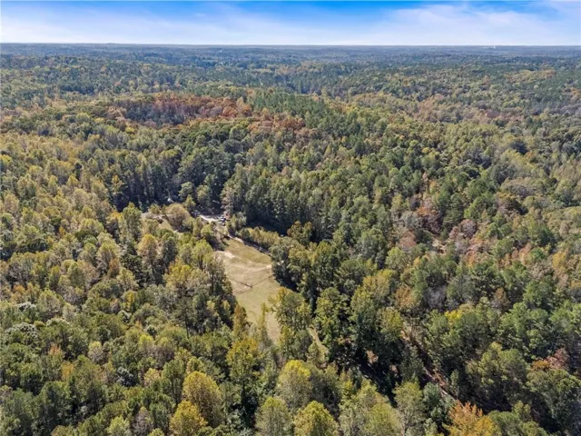 85.95 ACRES plus a cabin and stables.
