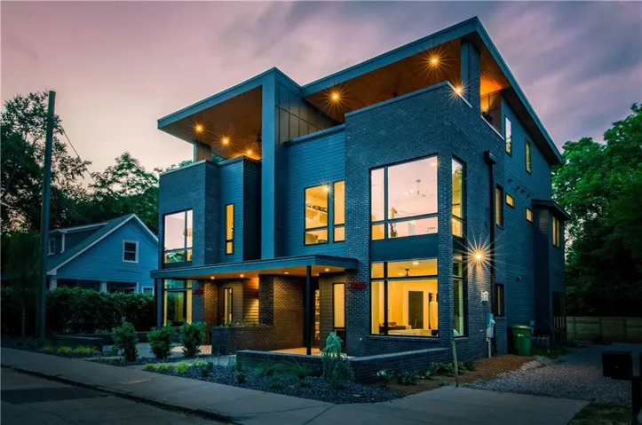 Modern exterior architecture with dark brick and horizontal siding