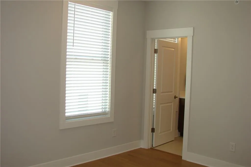 Secondary bedroom with view to bath