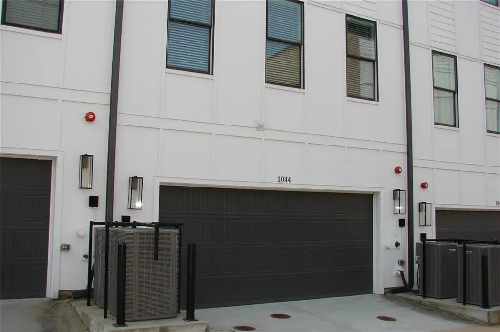 Garage with concrete driveway