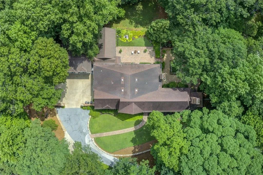 Ariel view of home, backyard and driveway