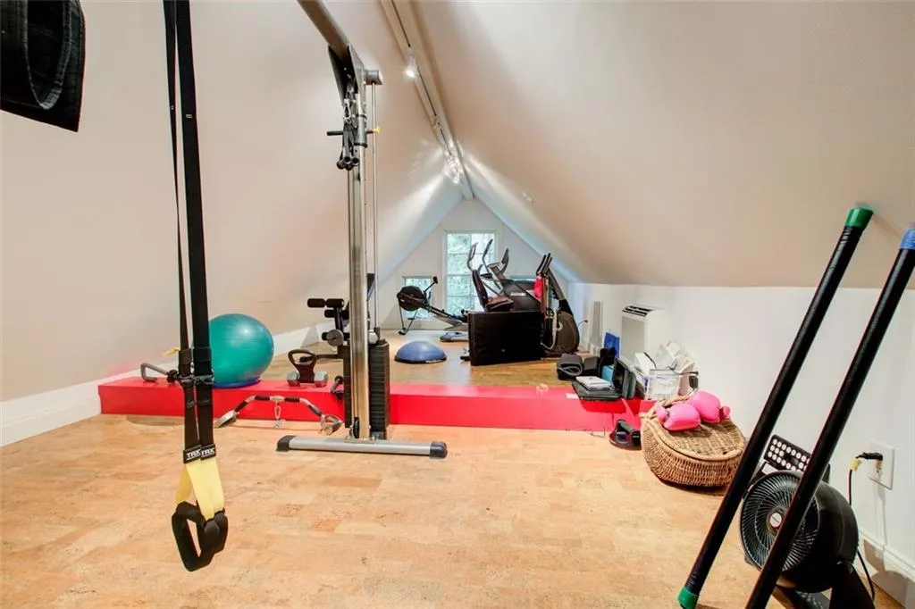 Loft exercise room in carriage house