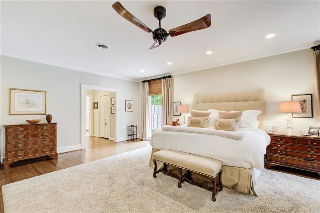 Spacious primary bedroom opens to spa like bathroom