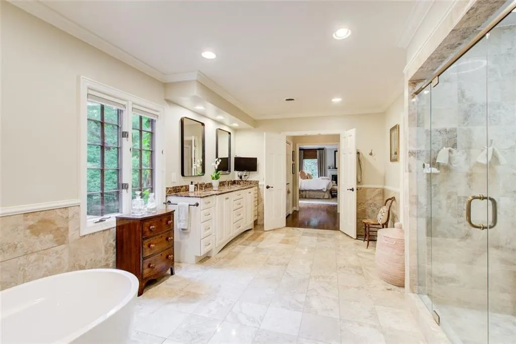 Spacious and spa like bath.