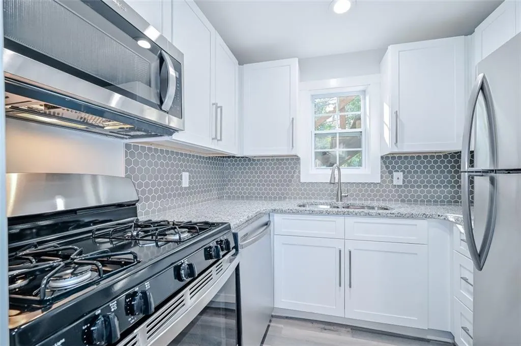 5643 Kingsport Drive, Atlanta, Georgia 30342, 2 Bedrooms Bedrooms, ,2 BathroomsBathrooms,Residential,Sold,5643 Kingsport Drive,7006095