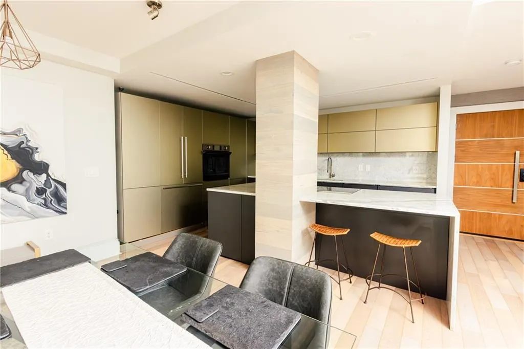 Dining space with light wood-type flooring