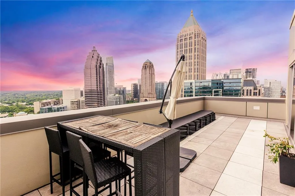 Patio / terrace with a skyline view